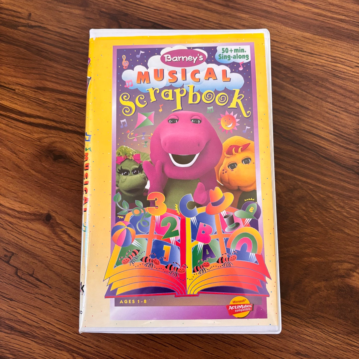 Barney Musical Scrapbook 1997 VHS featuring sing-along songs and cheerful kids music from the classic PBS series