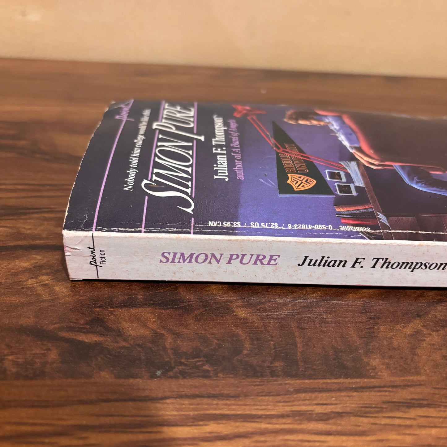 Scholastic 80s paperback Simon Pure by Julian F. Thompson, an old teen fiction book with coming-of-age storylines, campus drama, and vintage young adult book collector appeal.