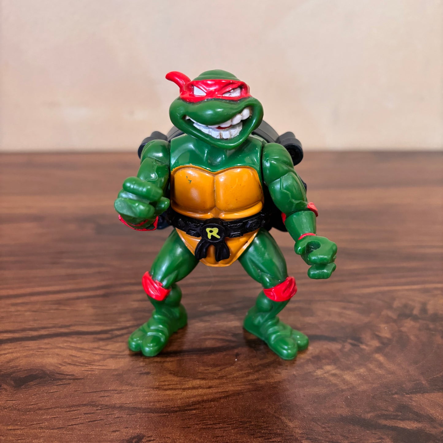 Teenage Mutant Ninja Turtles City Sewer Shell Raphael action figure (1991) by Playmates Toys. Classic retro TMNT collectible - perfect for 90s toy collectors.