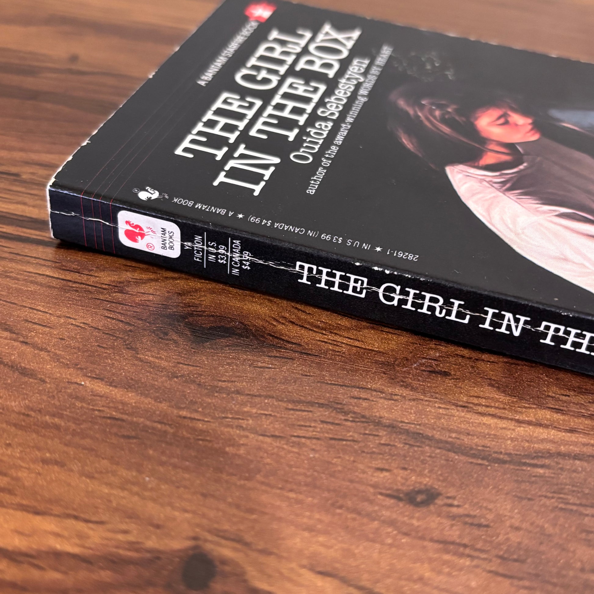 1989 Bantam Starfire book The Girl in the Box with dramatic cover art of a girl beside a typewriter, a vintage young adult paperback with emotional suspense and survival themes.