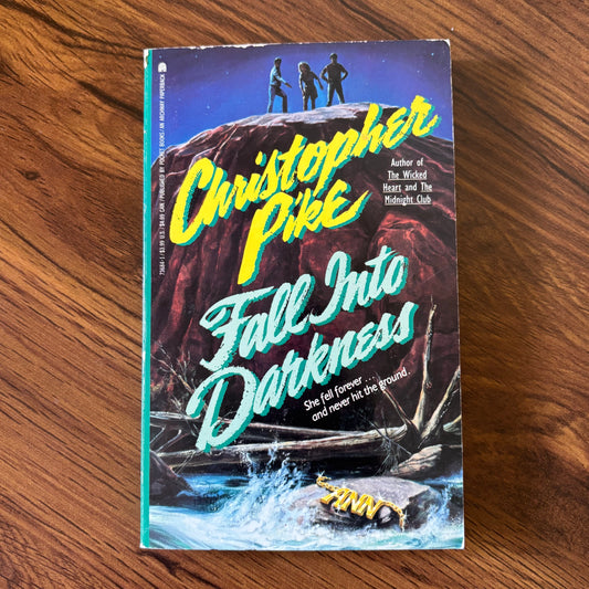 Fall Into Darkness by Christopher Pike – 1990 YA horror paperback novel. A gripping teen thriller about memory loss, supernatural suspense, and eerie mystery. Ideal for fans of 90s horror and vintage young adult books.
