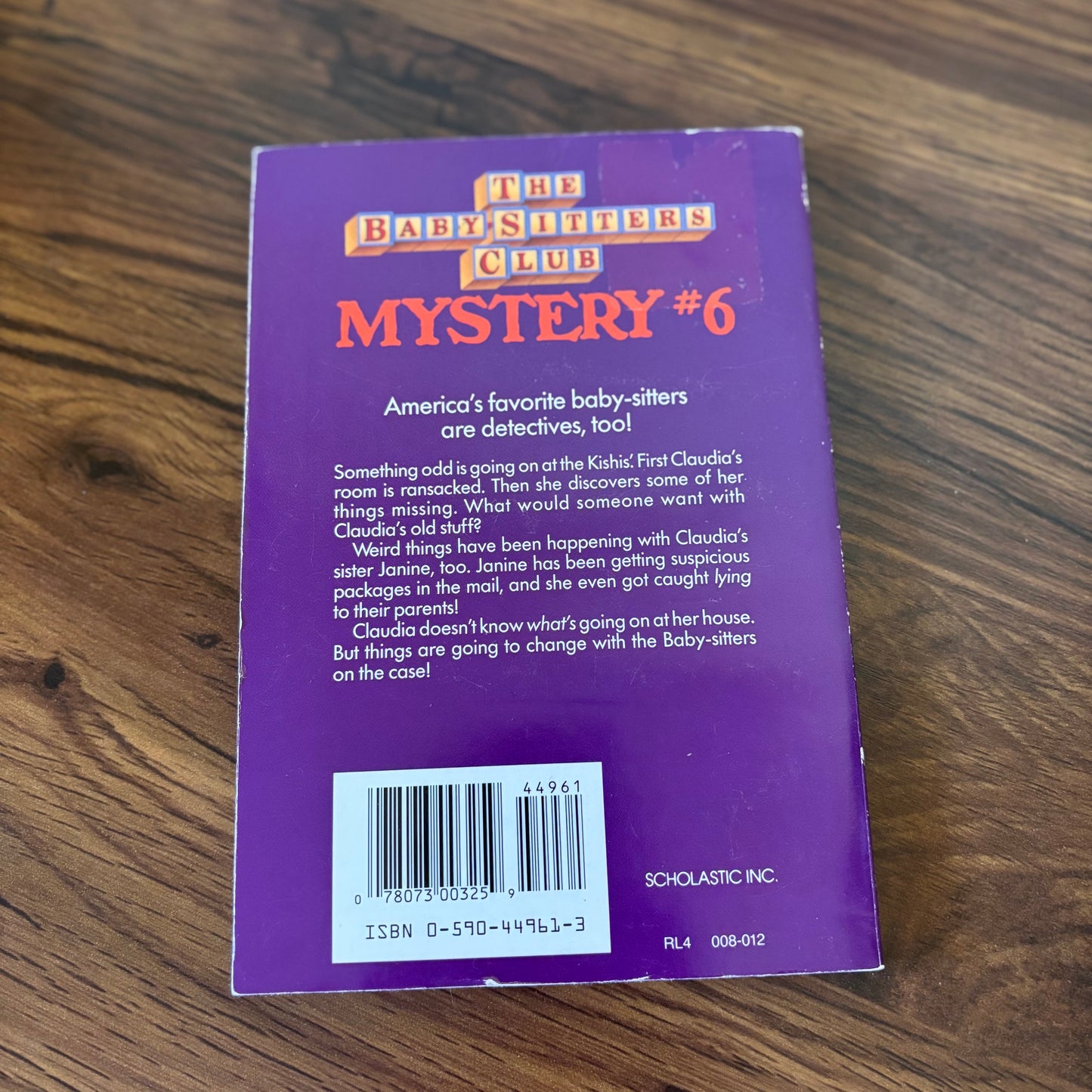 The Baby-Sitters Club Mystery #6: The Mystery at Claudia’s House by Ann M. Martin (1992 Scholastic Paperback)