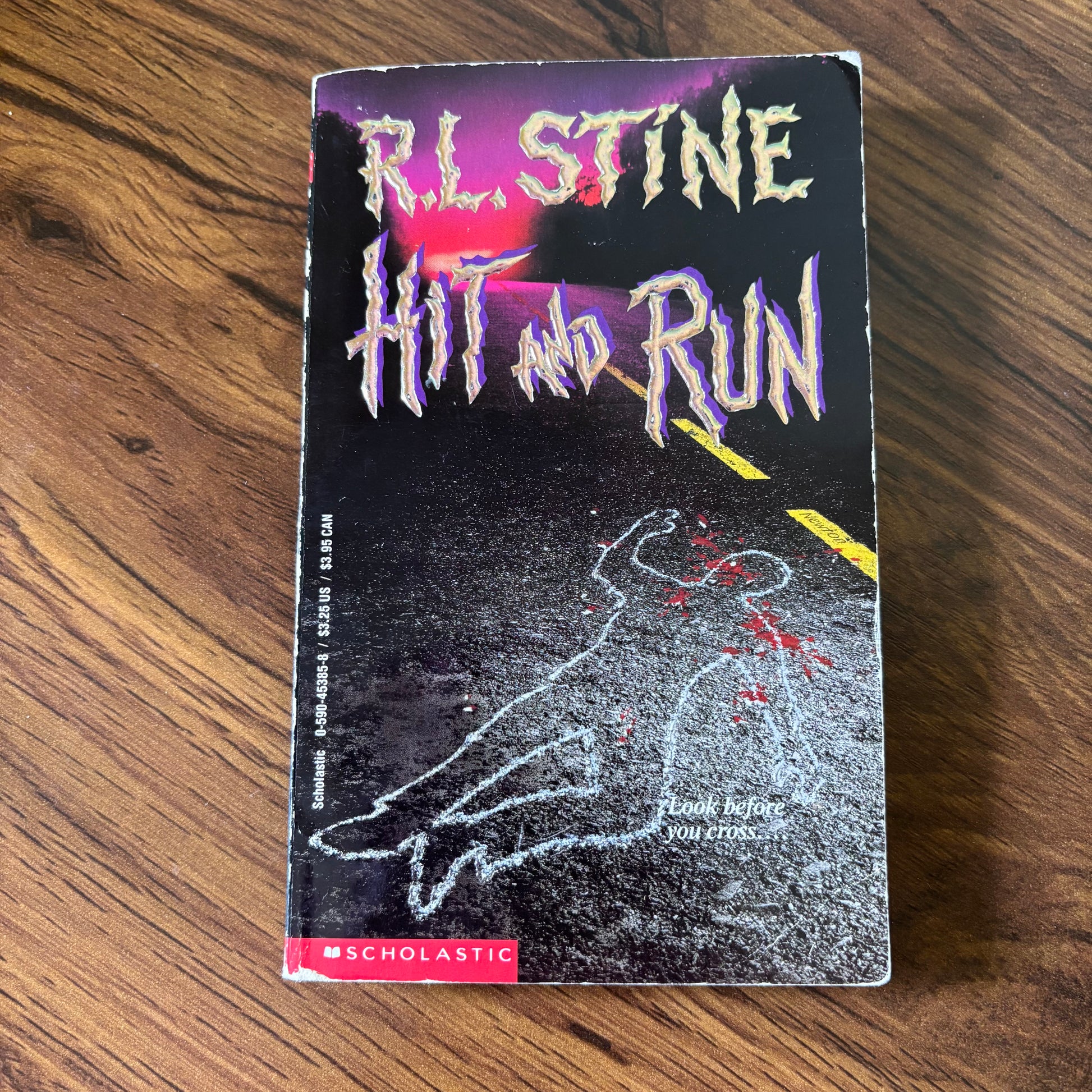 Hit and Run by R.L. Stine - 1992 Scholastic YA Thriller Paperback featuring a gripping suspenseful cover design, perfect for young adult readers who love thrilling mystery novels.