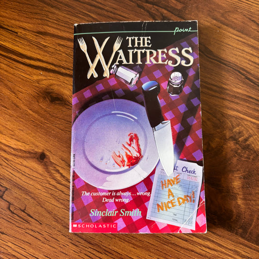The Waitress by Sinclair Smith - 1992 Point Fiction Thriller Paperback featuring a bloody dinner plate on the cover. This suspenseful crime thriller novel with a dark, gripping storyline is perfect for fans of murder mysteries and psychological thrillers. The cover design vividly portrays a chilling scene with a bloodstained plate, setting the tone for the eerie narrative inside.