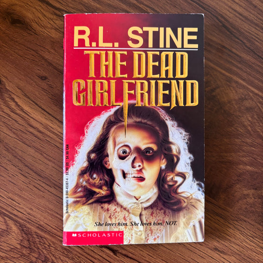 Discover the chilling suspense of The Dead Girlfriend, a classic 1993 YA thriller by R.L. Stine. This paperback edition, published by Scholastic, offers a gripping tale of mystery, horror, and unexpected twists. Ideal for fans of R.L. Stine’s spine-tingling works, this book is a must-have for collectors of vintage young adult thrillers. Grab your copy today and dive into the suspenseful world of R.L. Stine’s storytelling.