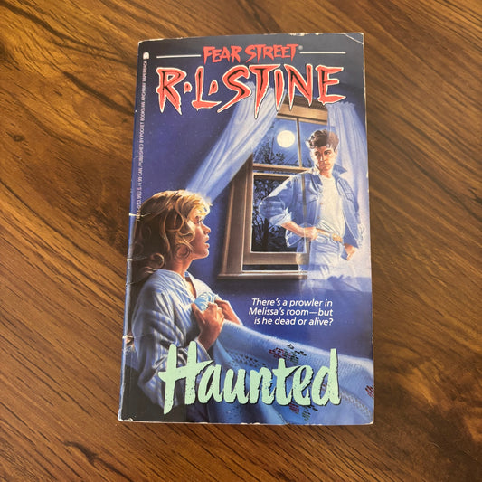 Fear Street: Haunted by R.L. Stine 1990 - Archway Paperback. A spine-chilling addition to the classic Fear Street series, perfect for collectors and teen horror fans.