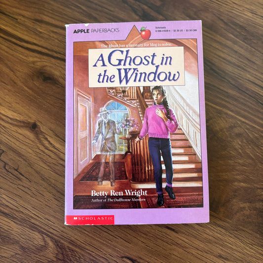 A Ghost in the Window by Betty Ren Wright - 1988 Scholastic paperback edition, a haunting mystery about a young girl who discovers an eerie ghostly presence in her home and unravels a chilling story from the past!