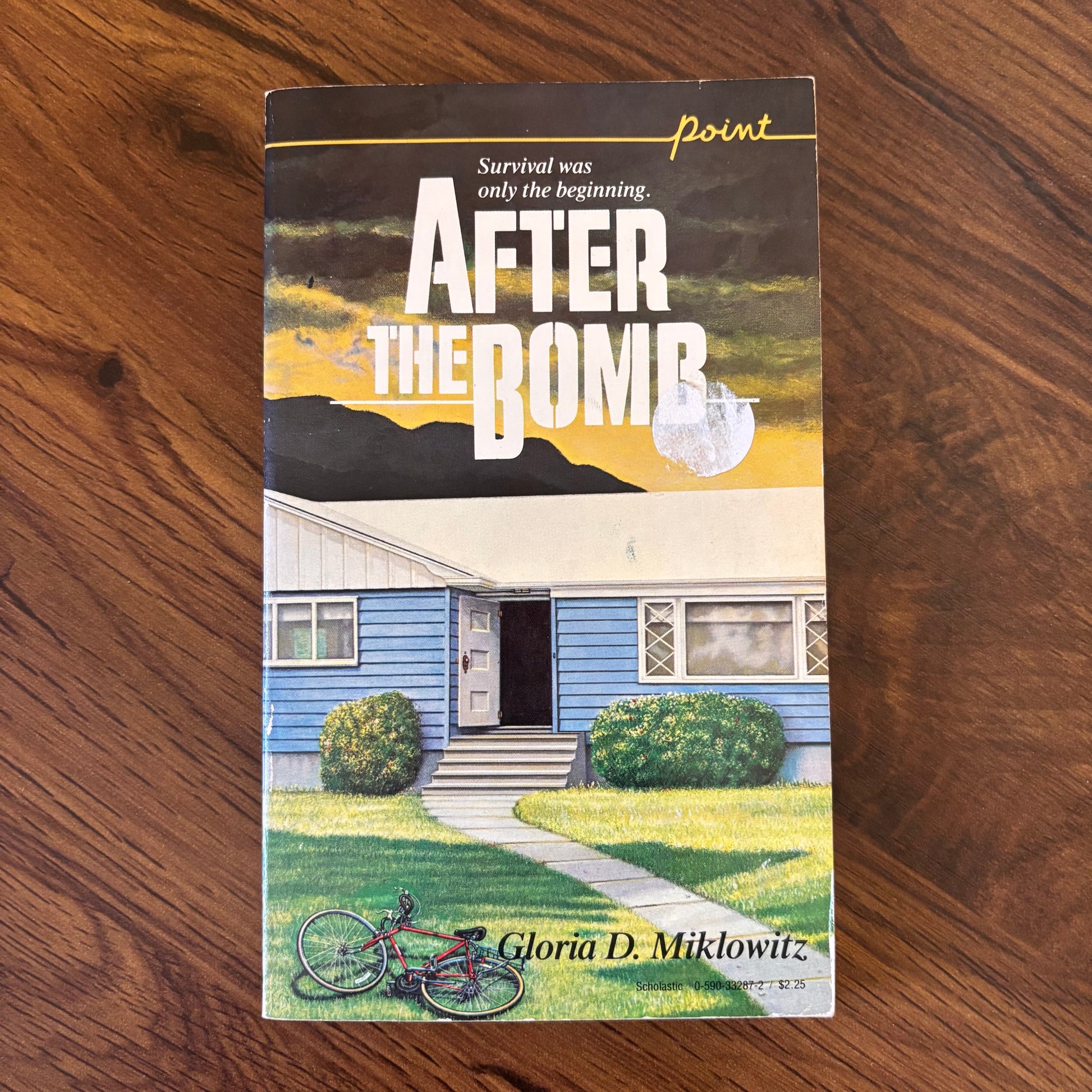 After the Bomb by Gloria D. Miklowitz, 1985 Point Fiction paperback. A chilling Cold War survival novel following a teen navigating life after nuclear disaster. A gritty, vintage YA dystopian classic for lovers of post-apocalyptic fiction and 80s paperback drama. omgihadthat.com