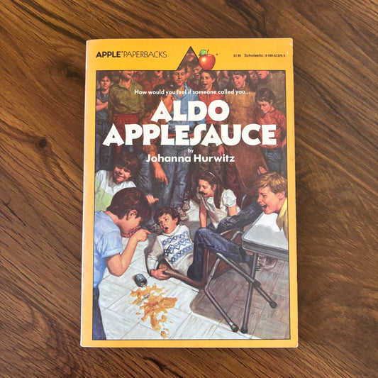 Aldo Applesauce by Johanna Hurwitz, 1979 Scholastic Apple Paperback. A wholesome and awkward slice-of-life read about new schools, spilled lunches, and finding your place. Classic 70s middle grade nostalgia from omgihadthat.com.
