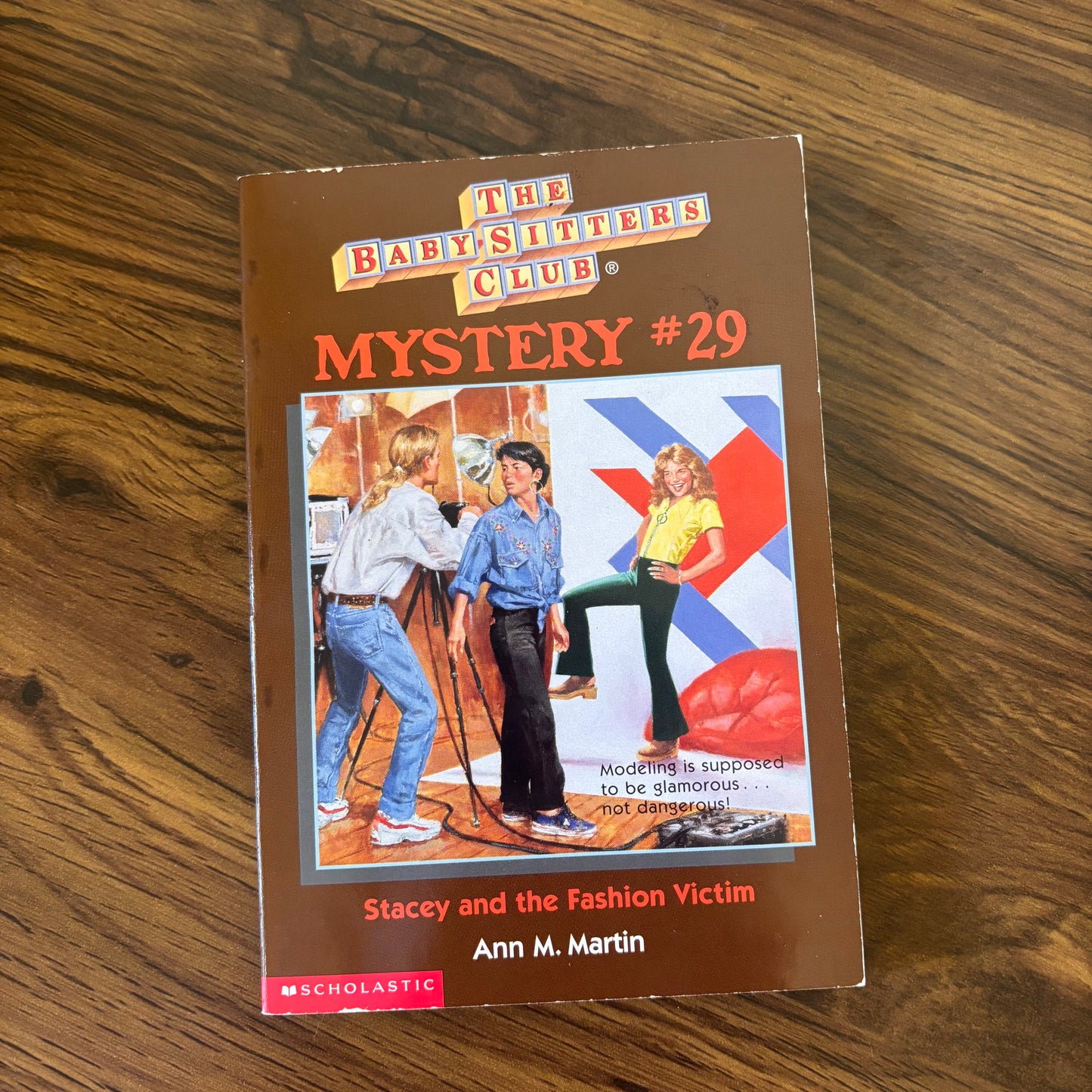 The Baby-Sitters Club Mystery #29: Stacey and the Fashion Victim by Ann M. Martin - 1997 Scholastic paperback edition, a stylish mystery where Stacey investigates a case involving a fashion crisis and unexpected twists!
