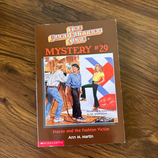The Baby-Sitters Club Mystery #29: Stacey and the Fashion Victim by Ann M. Martin - 1997 Scholastic paperback edition, a stylish mystery where Stacey investigates a case involving a fashion crisis and unexpected twists!