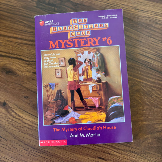 Baby-Sitters Club Mystery #6: Claudia's House by Ann M. Martin - Scholastic paperback edition, a gripping mystery where Claudia and the Baby-Sitters Club must uncover the secrets surrounding an eerie event at her house!