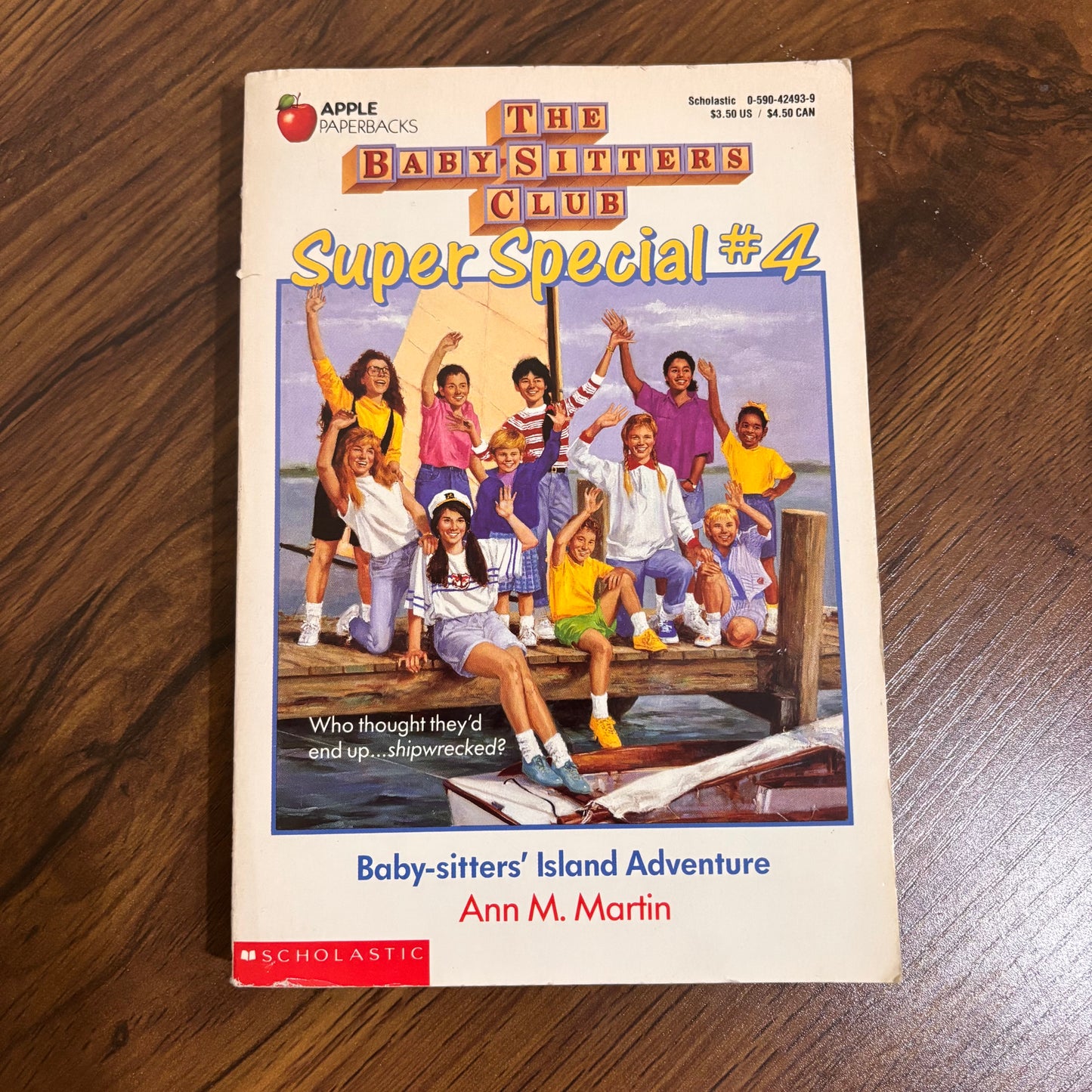 Cover of The Baby-Sitters Club Super Special #4: Baby-Sitters Island Adventure by Ann M. Martin, a 1990 Scholastic Apple paperback featuring a tropical adventure story from the classic series.