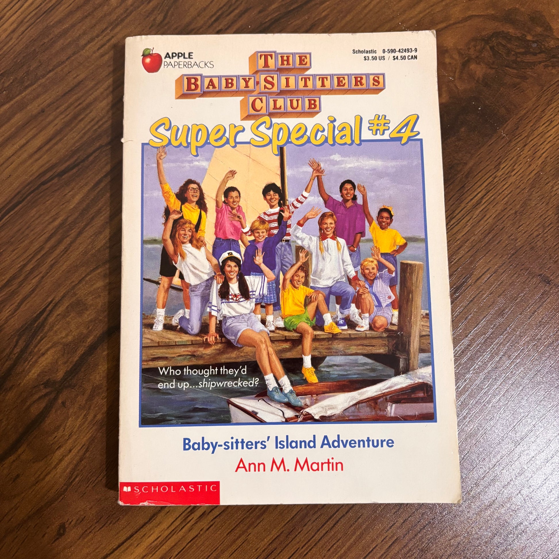 Cover of The Baby-Sitters Club Super Special #4: Baby-Sitters Island Adventure by Ann M. Martin, a 1990 Scholastic Apple paperback featuring a tropical adventure story from the classic series.