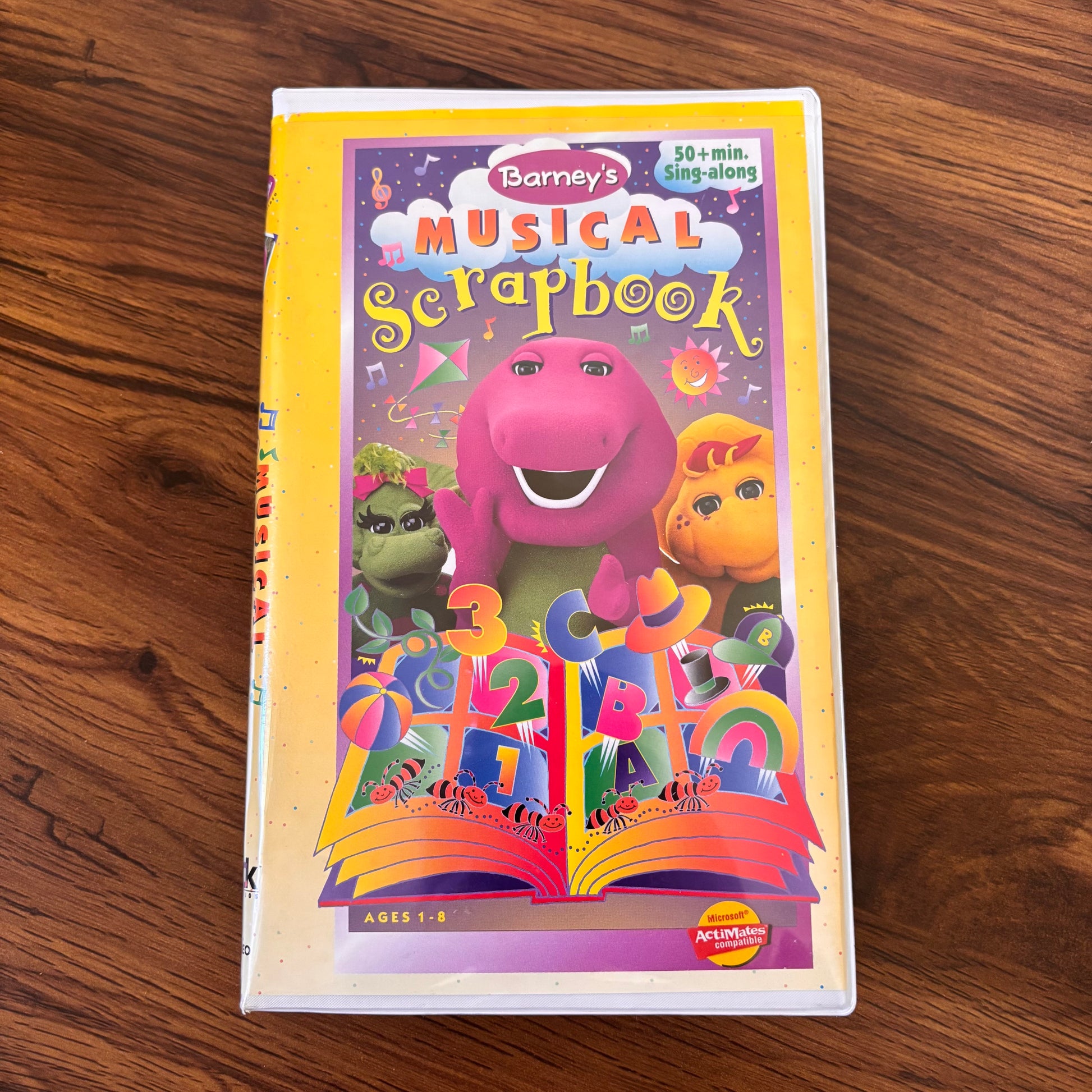 Barney Musical Scrapbook 1997 VHS featuring sing-along songs and cheerful kids music from the classic PBS series