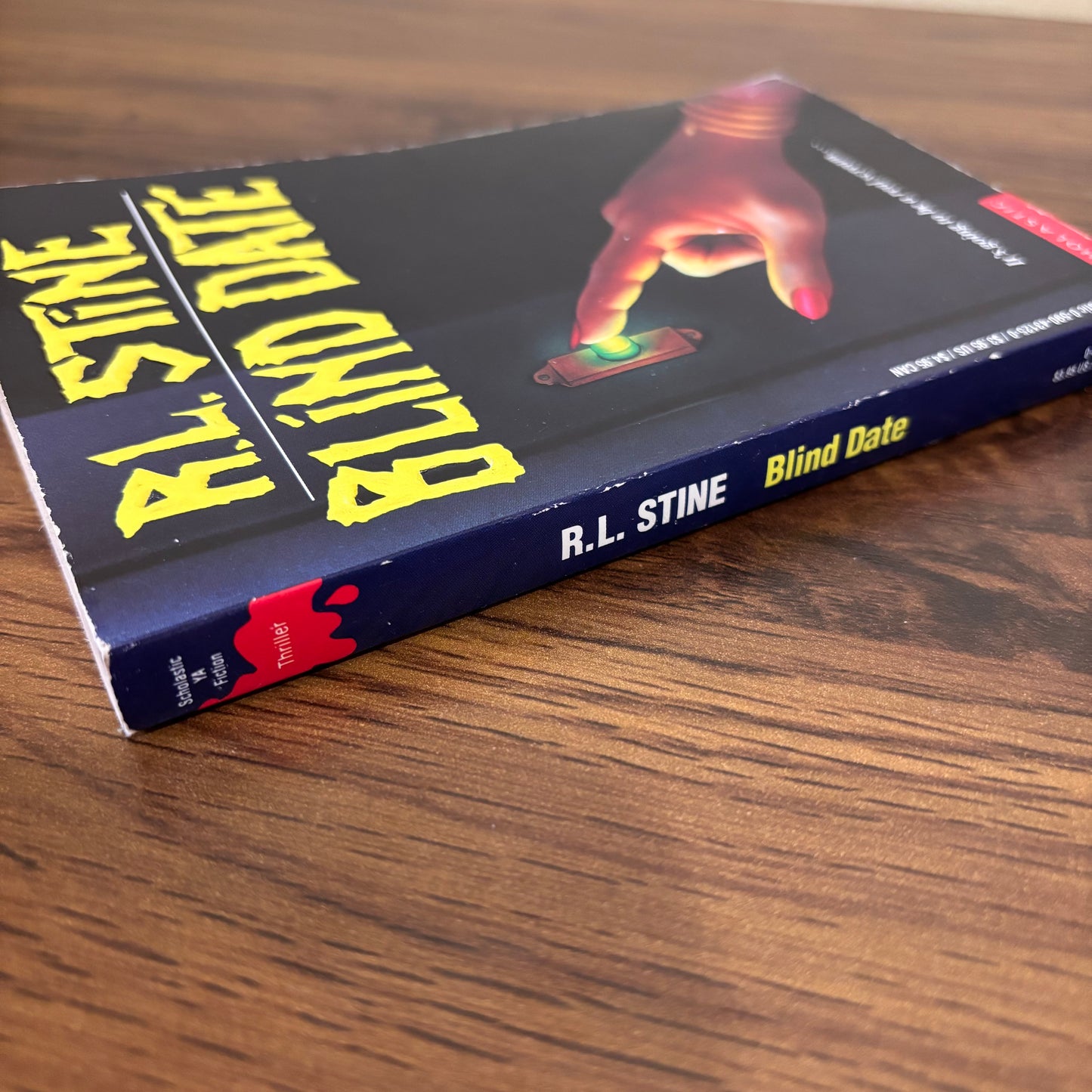 Blind Date 1986 R.L. Stine paperback with black cover, glowing doorbell artwork, and the tagline “It’s going to be a real scream,” a collectible vintage YA horror book.