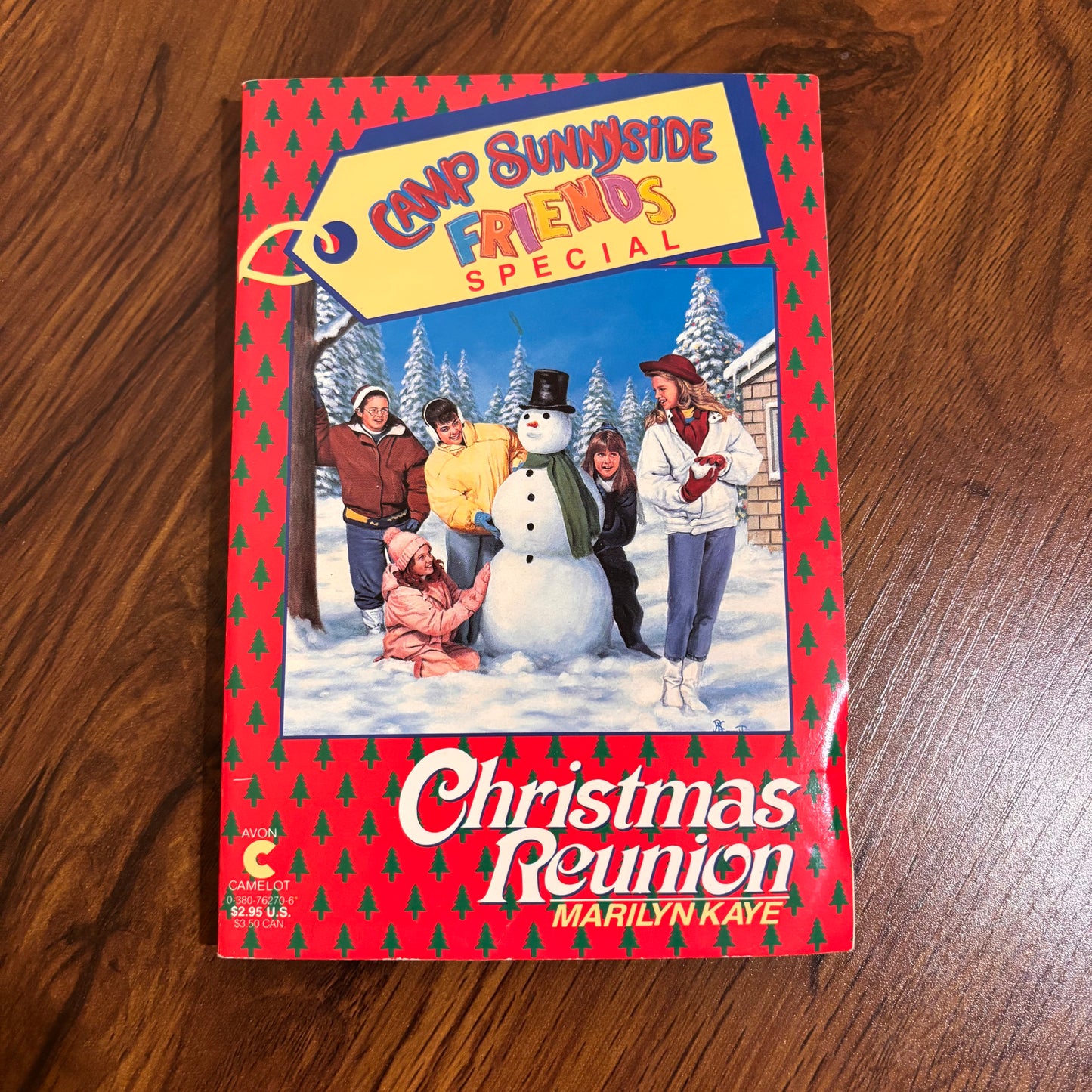 Cover of Camp Sunnyside Friends Special: Christmas Reunion by Marilyn Kaye, a 1990 Avon Camelot paperback featuring a winter holiday reunion story with friendship drama.