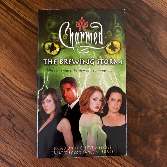 Charmed: The Brewing Storm paperback by Constance M. Burge, 2004 mystical media tie-in book with the Halliwell sisters facing supernatural danger