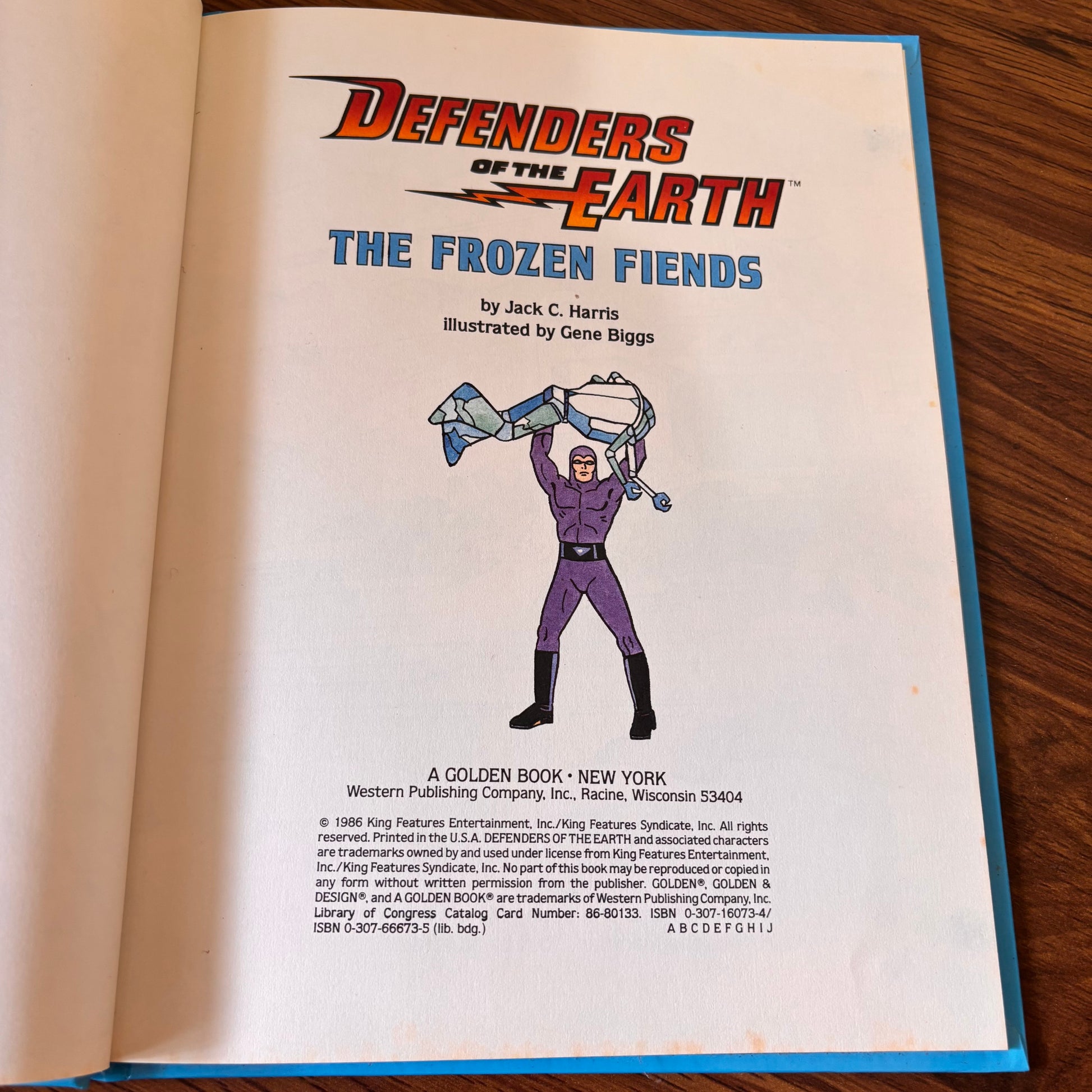 Defenders of the Earth The Frozen Fiends 1986 Golden Book hardcover by Jack C. Harris, a vintage kids adventure book tied to the classic 80s animated superhero series.