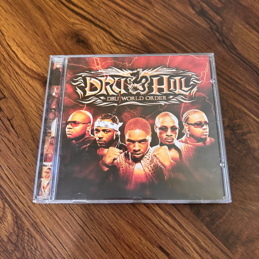 Dru World Order CD by Dru Hill (2002). A smooth early 2000s R&B album featuring Sisqó and the group’s signature harmonies, heartbreak anthems, and soulful slow jams. A must-have throwback for nostalgic music collectors. omgihadthat.com