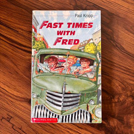 Flat cover of Fast Times with Fred by Paul Kropp - 1986 Scholastic teen paperback featuring Justin, Jay-Jay, and the Juvenile Dinkent in peak 80s misfit mayhem