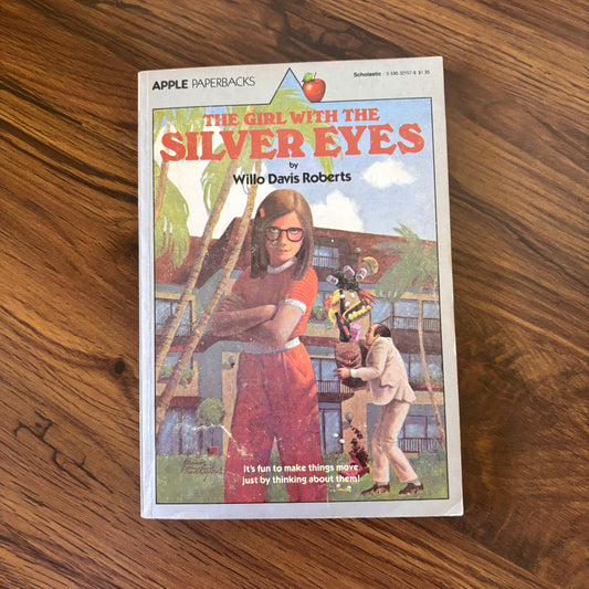 The Girl with the Silver Eyes by Willo Davis Roberts - 1980 paperback edition, a suspenseful and intriguing novel about a young girl with mysterious powers and the challenges she faces in a world that doesn’t understand her.