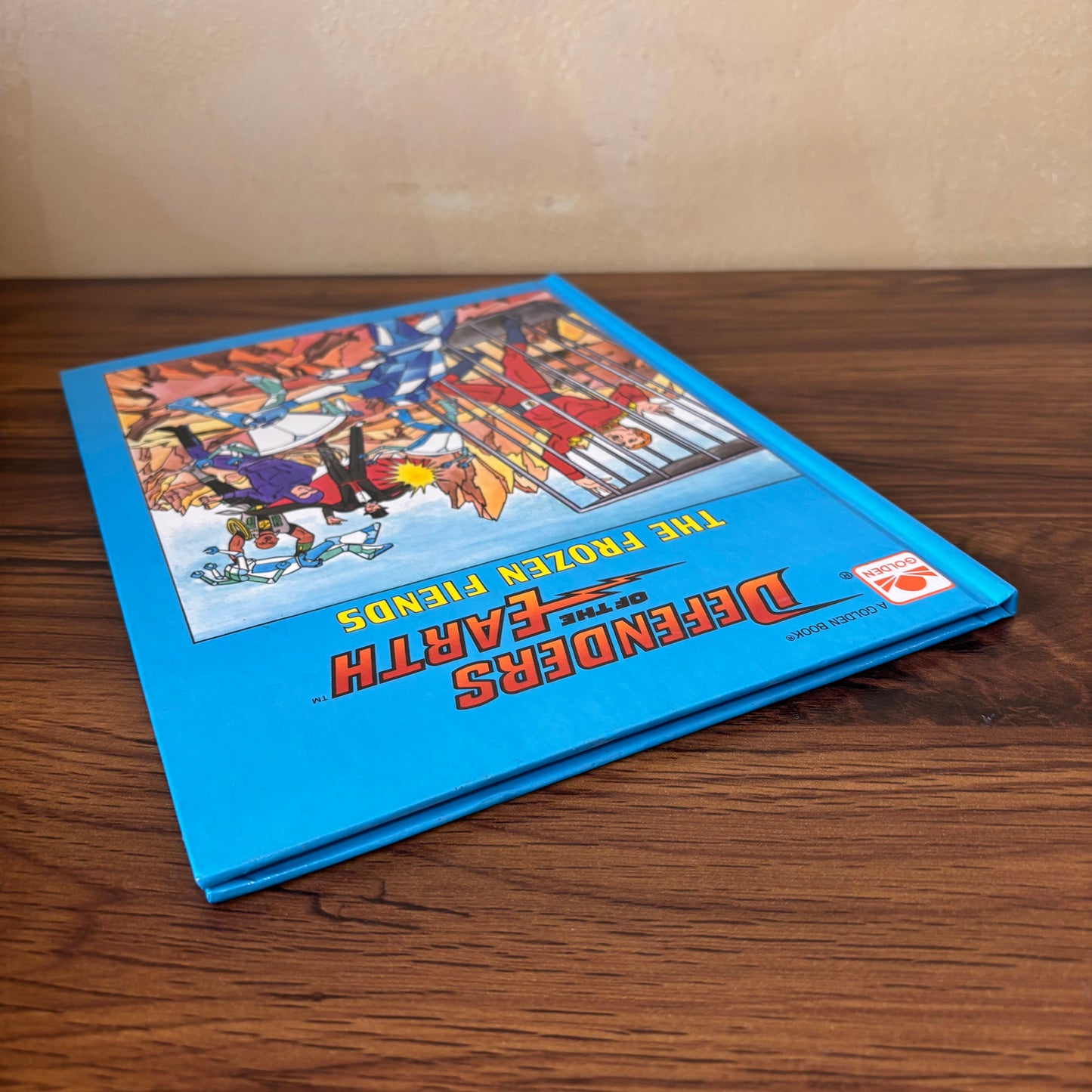 Golden Book Defenders of the Earth 1986 hardcover featuring The Frozen Fiends by Jack C. Harris, a collectible vintage children’s book with retro cartoon superhero artwork.