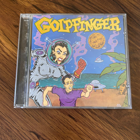 Goldfinger’s self-titled 1996 CD (Mojo Records), featuring ska-punk anthems like “Here in Your Bedroom.” Packed with 90s Warped Tour energy and alien beach brawls. A ska-core must-have from omgihadthat.com.