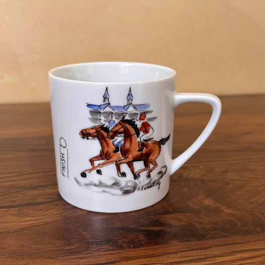 Hand-painted, artist-signed Kentucky Derby Museum mug featuring horse racing design. A collectible Derby souvenir, perfect for horse racing fans and memorabilia collectors.