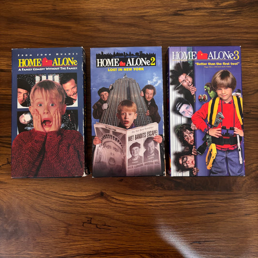 90s Home Alone VHS bundle featuring Home Alone 1, 2, and 3 with classic retro movie covers, nostalgic holiday comedy collection!