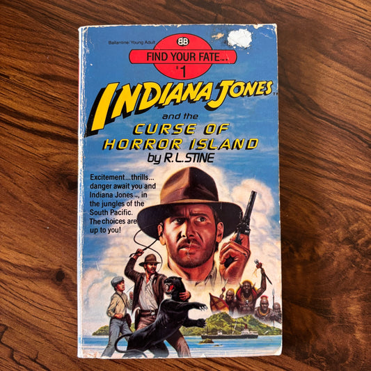 1985 flat cover of Indiana Jones and the Curse of Horror Island by R.L. Stine - Action-packed pulp adventure from the peak of paperback thrills!