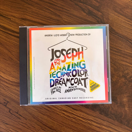 Joseph and the Amazing Technicolor Dreamcoat CD, 1992 Canadian cast recording featuring Donny Osmond. A beloved musical theatre classic packed with biblical drama, catchy songs, and full rainbow energy. A stage-to-stereo favorite from omgihadthat.com.