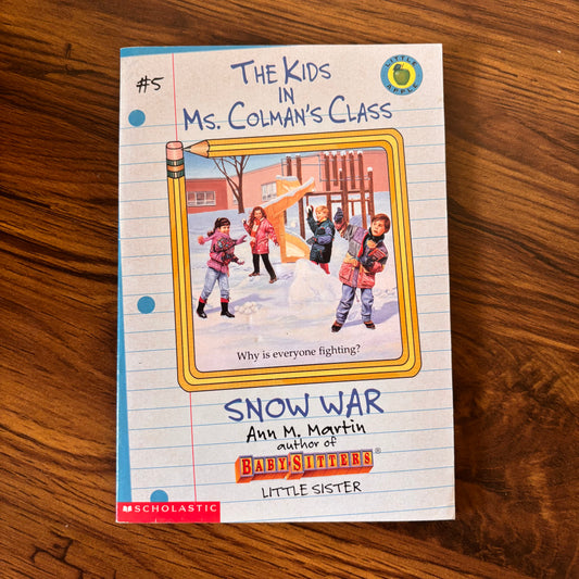 Flat lay of The Kids in Ms. Colman’s Class #5: Snow Wars by Ann M. Martin — a 90s snowy school day story from the heart of nostalgic chapter book shelves!