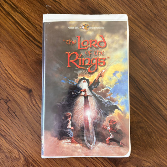 2001 The Lord of the Rings VHS from Warner Bros, epic fantasy adventure movie with vintage packaging and iconic cover art