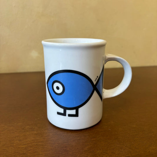 Vintage Marc Tetro Blue Fish mug by Danesco Inc. A collectible ceramic mug featuring minimalist fish design by the Canadian artist. Perfect for collectors and art lovers.