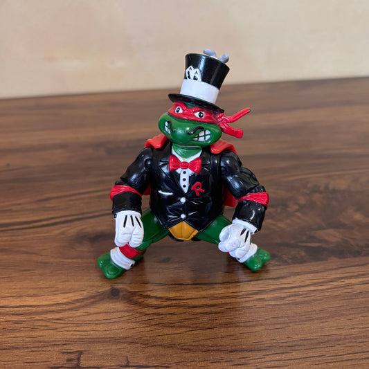 Raph the Magnificent 1992 TMNT magician figure by Playmates. Vintage Raphael with magician accessories, perfect for nostalgic TMNT collectors and fans of rare 90s figures!