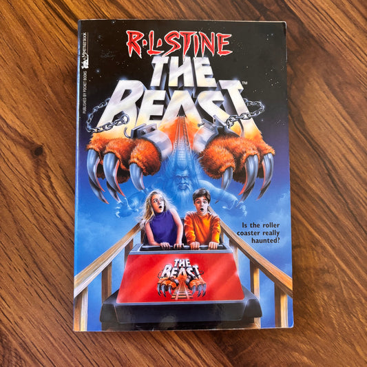 1994 paperback edition of The Beast by R.L. Stine, published by Minstrel Books. 90s teen horror thriller featuring amusement park scares, bold cover art, and signature R.L. Stine suspense.