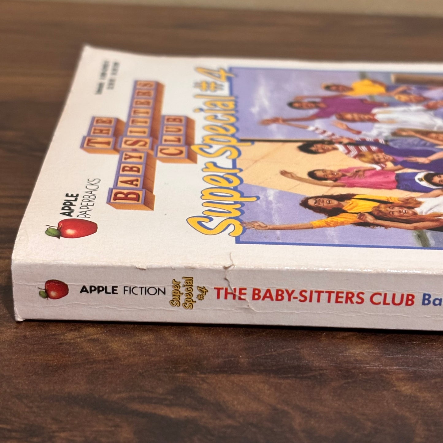 Scholastic Baby-Sitters Club Island Adventure 90s paperback book with original cover art, a nostalgic summer vacation story for collectors of vintage kids books and retro girls series fiction.