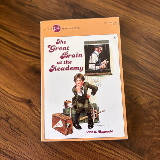 The Great Brain at the Academy by John D. Fitzgerald - 1988 Dell Yearling paperback edition, part of the beloved Great Brain series, following the clever and mischievous antics of Tom D. as he navigates life at an academy.