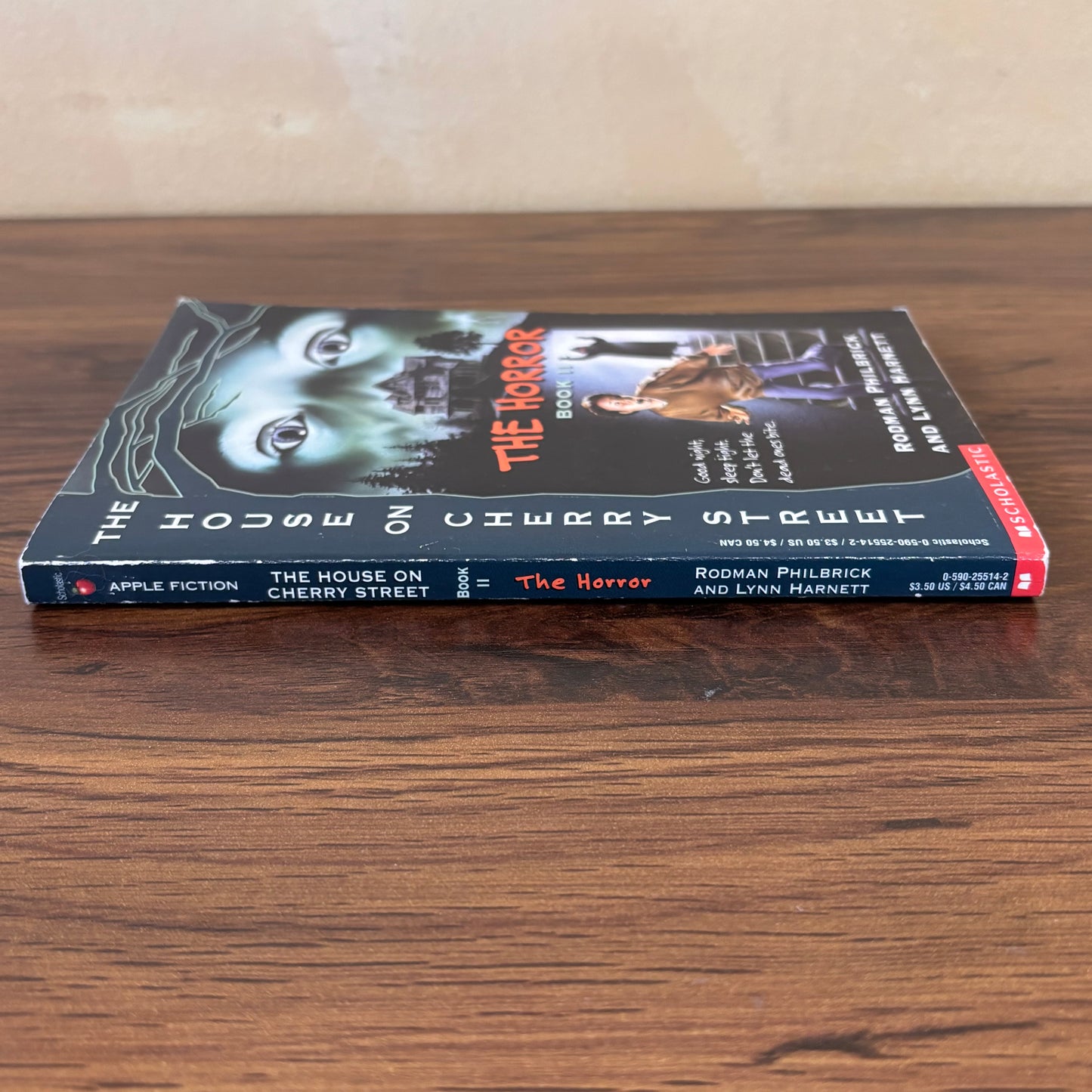 The Horror Book II from The House on Cherry Street series, a scary kids paperback with creepy house artwork, babysitter suspense, and nostalgic Scholastic book fair vibes.