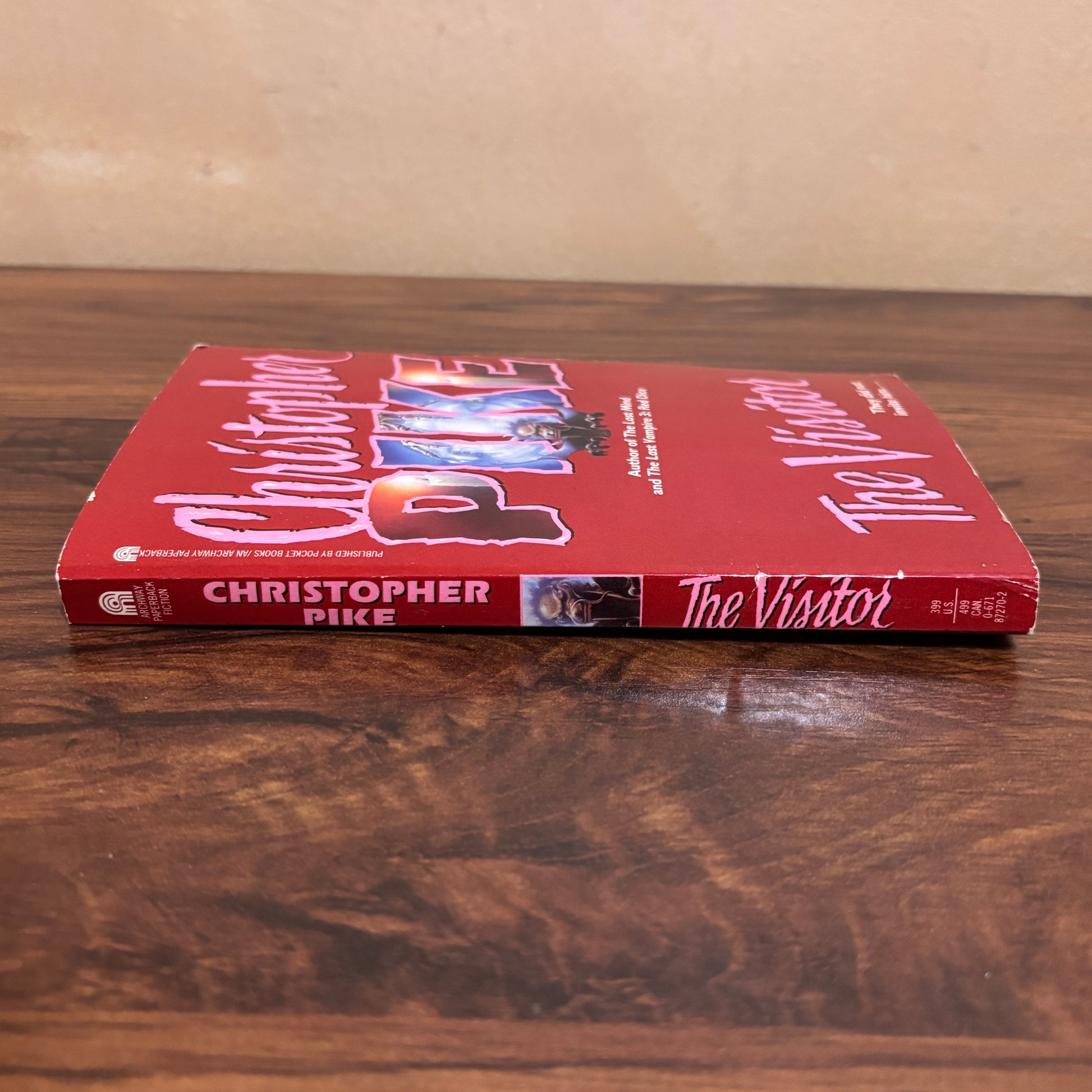 The Visitor by Christopher Pike vintage paperback book with original cover design, a collectible retro teen horror novel from the classic young adult thriller era.
