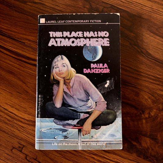 This Place Has No Atmosphere by Paula Danziger. A Dell sci-fi YA paperback blending 80s teen life with a move to the moon