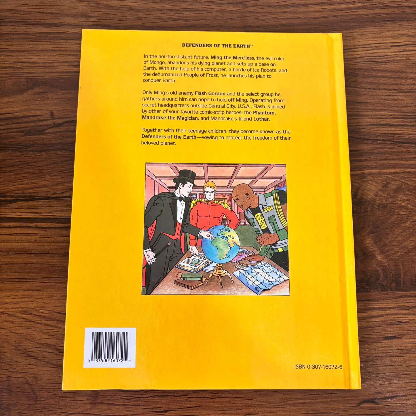 Vintage 80s cartoon book Defenders of the Earth Ming the Menace, a Golden Book hardcover with Ming on the cover, animated series nostalgia, and classic children’s adventure story appeal.