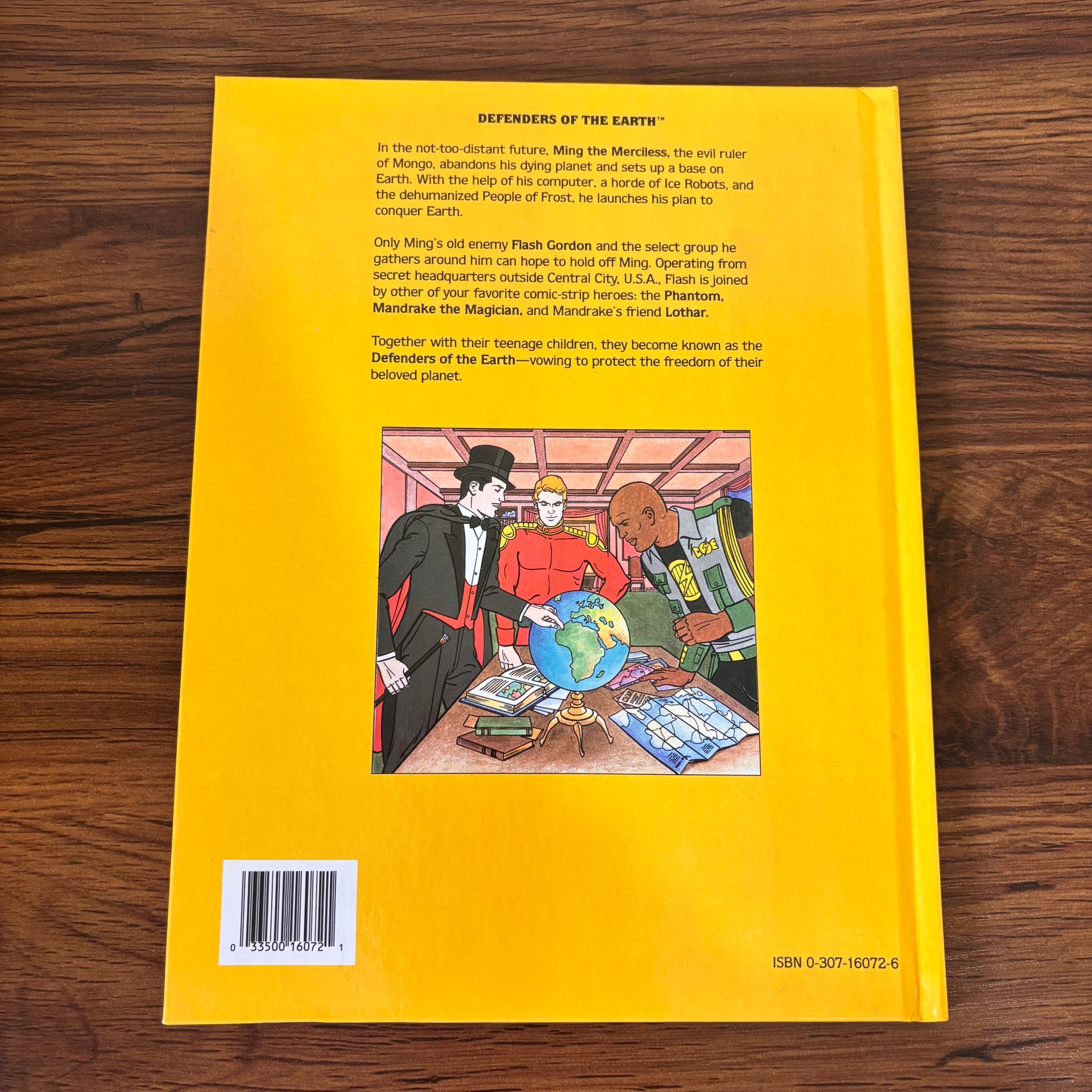Vintage 80s cartoon book Defenders of the Earth Ming the Menace, a Golden Book hardcover with Ming on the cover, animated series nostalgia, and classic children’s adventure story appeal.