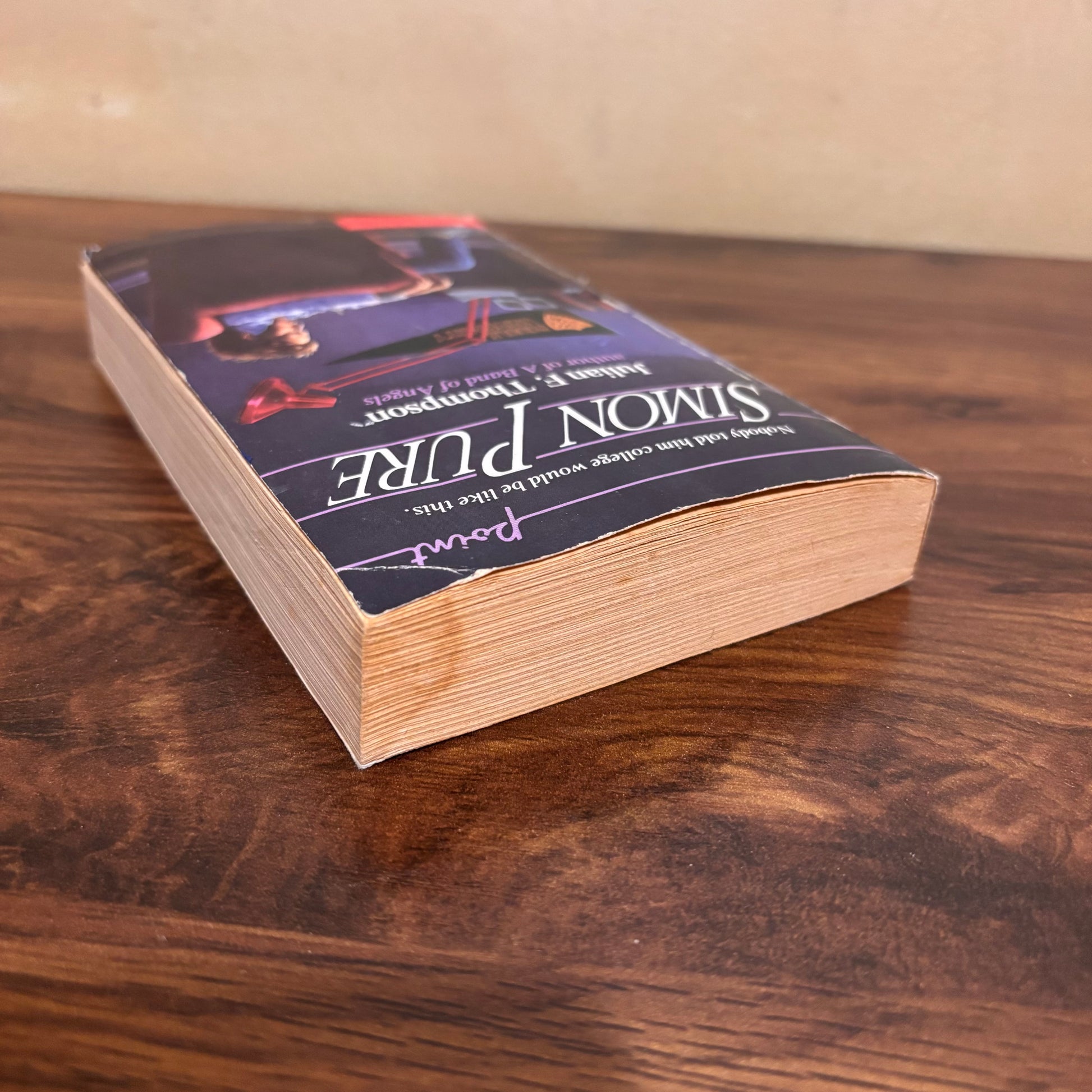 Vintage college life teen novel Simon Pure by Julian F. Thompson, a Scholastic paperback with retro 1980s cover art, school fiction themes, and nostalgic teen reading appeal.