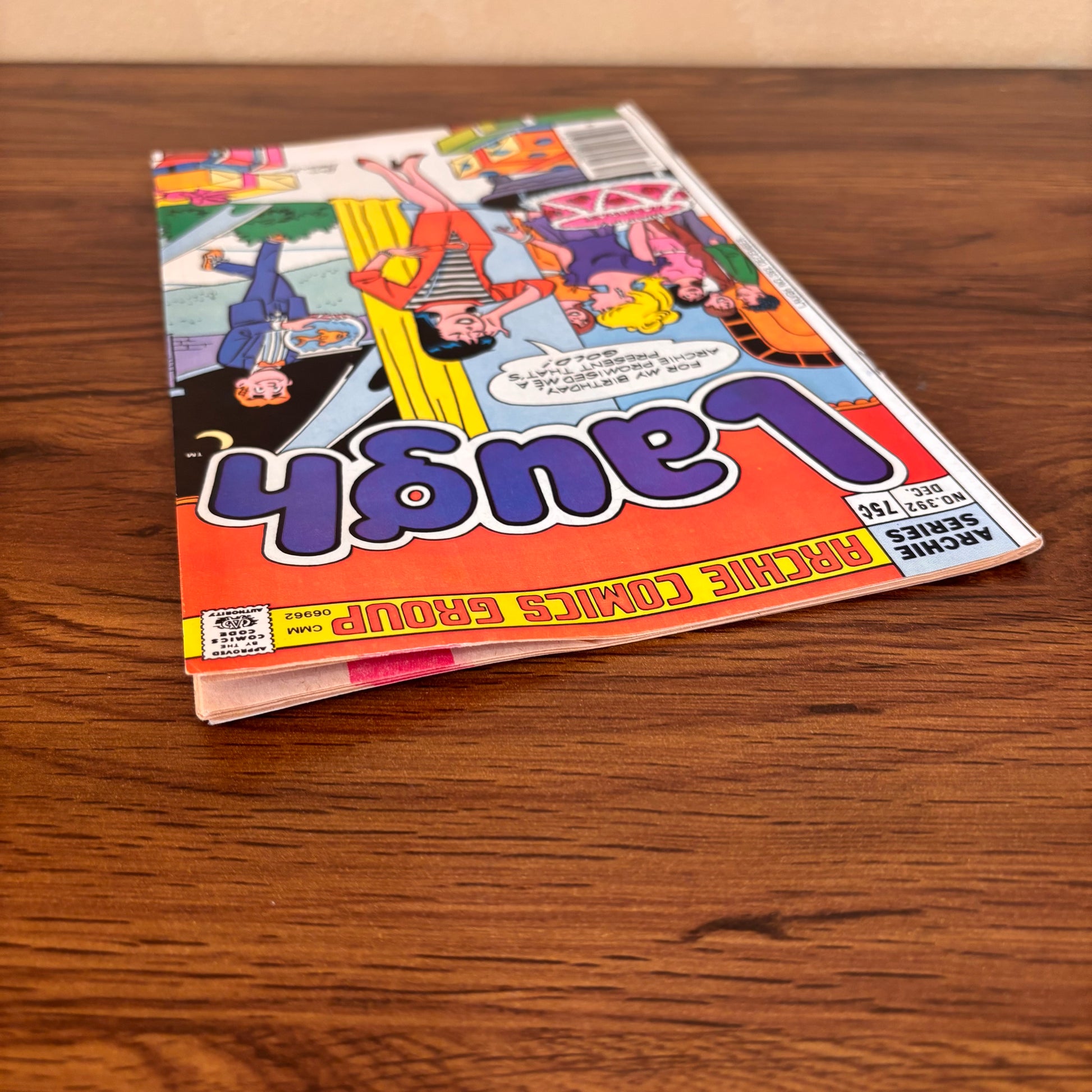 Vintage Riverdale humor comic Archie Laugh 392 with birthday cake, presents, and classic Archie Comics characters, a nostalgic comic book for collectors of retro teen comics.