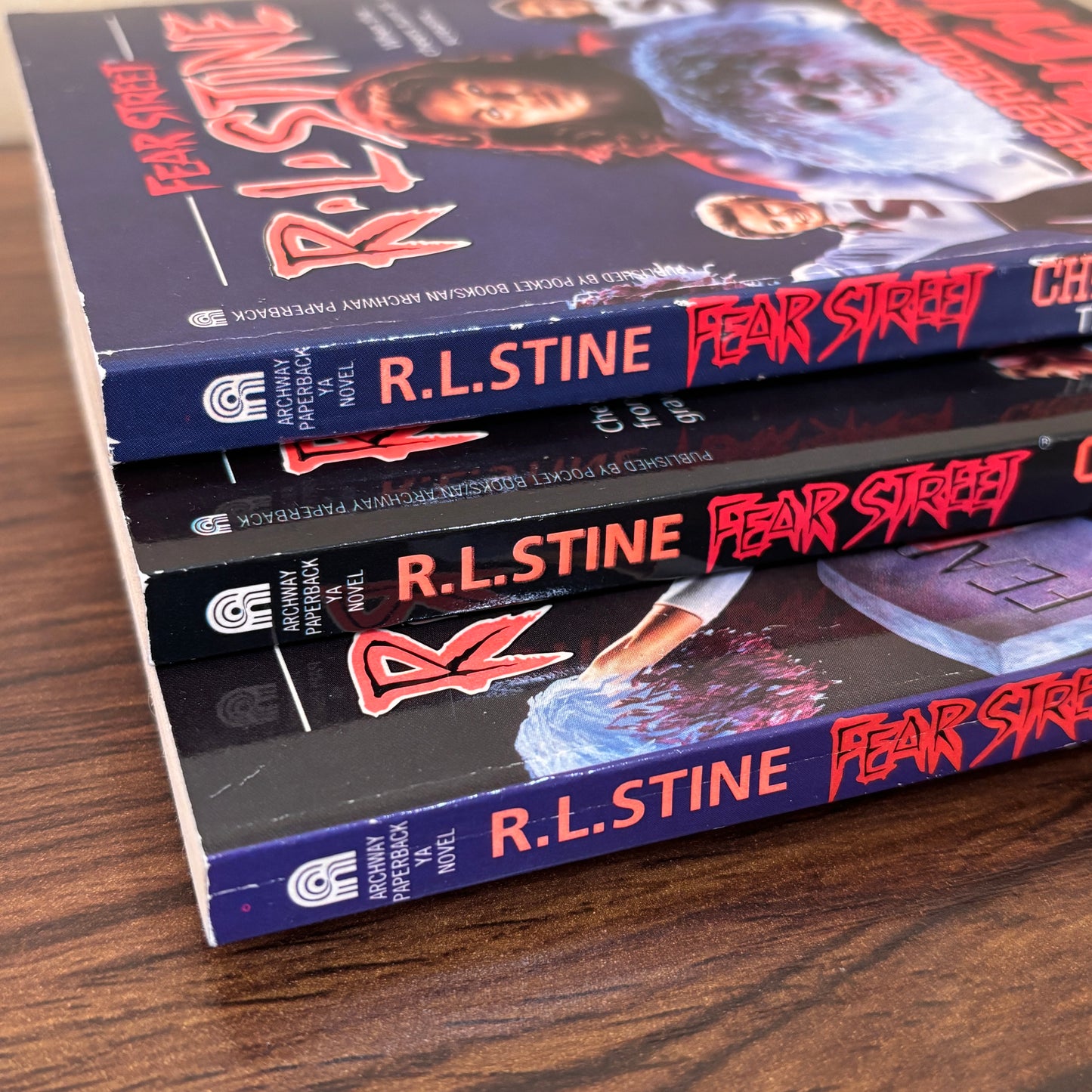 Vintage 90s R.L. Stine Fear Street Cheerleaders horror paperbacks displayed together, featuring spooky teen thriller cover art and collectible young adult fiction nostalgia.